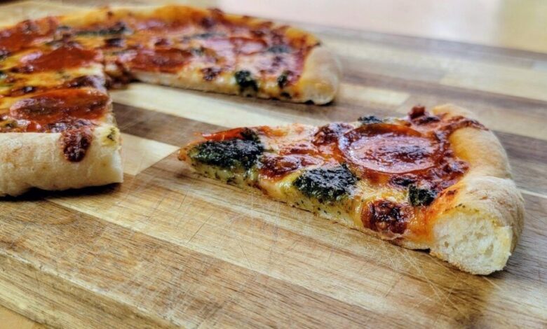 Homemade gluten-free pizza made with high-quality flour, fresh toppings, and golden crust.