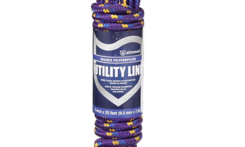 Boater handling Attwood 11704-2 rope, demonstrating its utility and versatility in marine tasks.