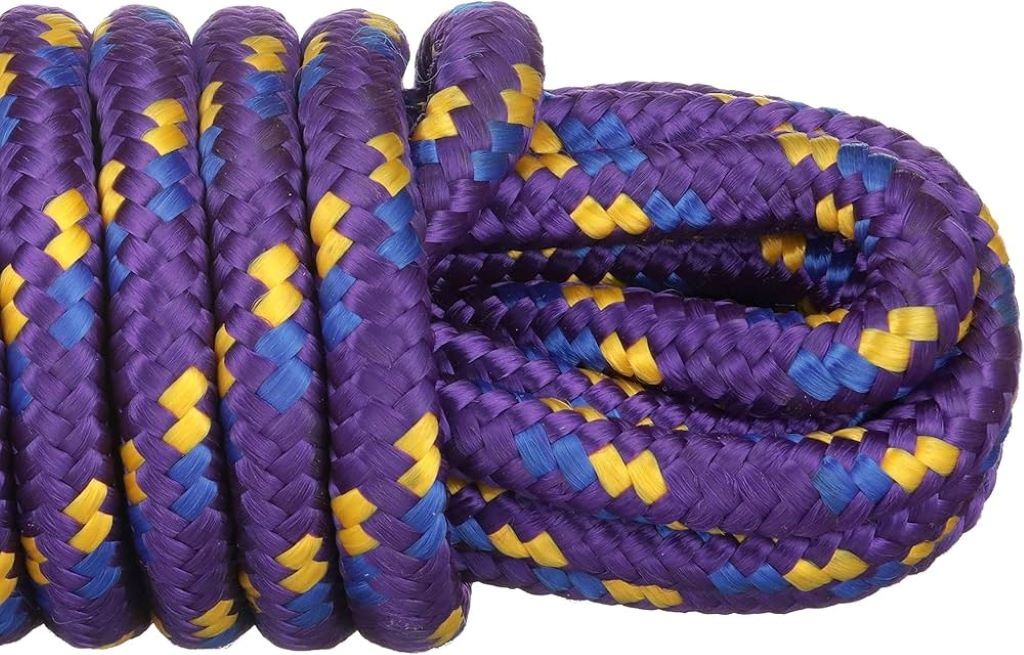 Attwood 11704-2 braided polypropylene rope coiled on a boat, showing strength and flexibility.