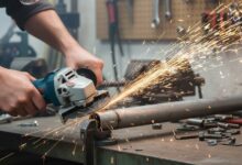 Bosch GWS8-45 Angle Grinder cutting metal pipe