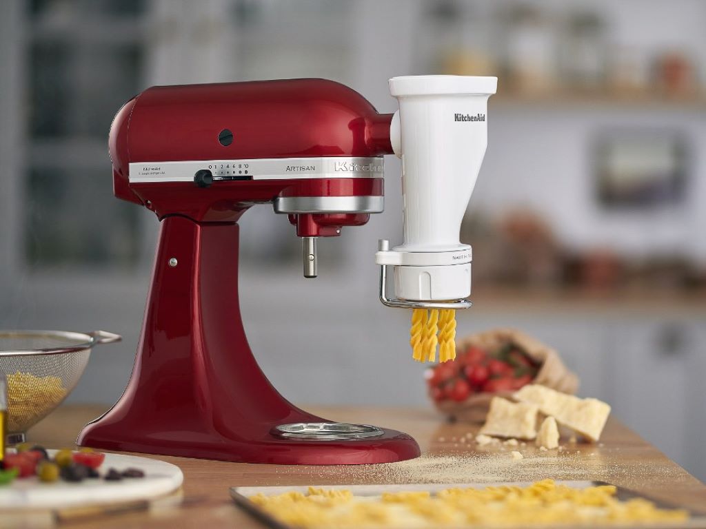 Close-up of KitchenAid Pasta Press in use for homemade pasta