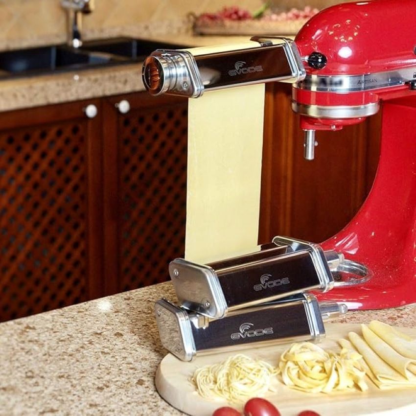 Gvode pasta roller and cutter attachments connected to a KitchenAid stand mixer.