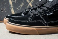 Suede skate shoes with reinforced toe area and multiple protective layers designed for enhanced durability during skateboarding