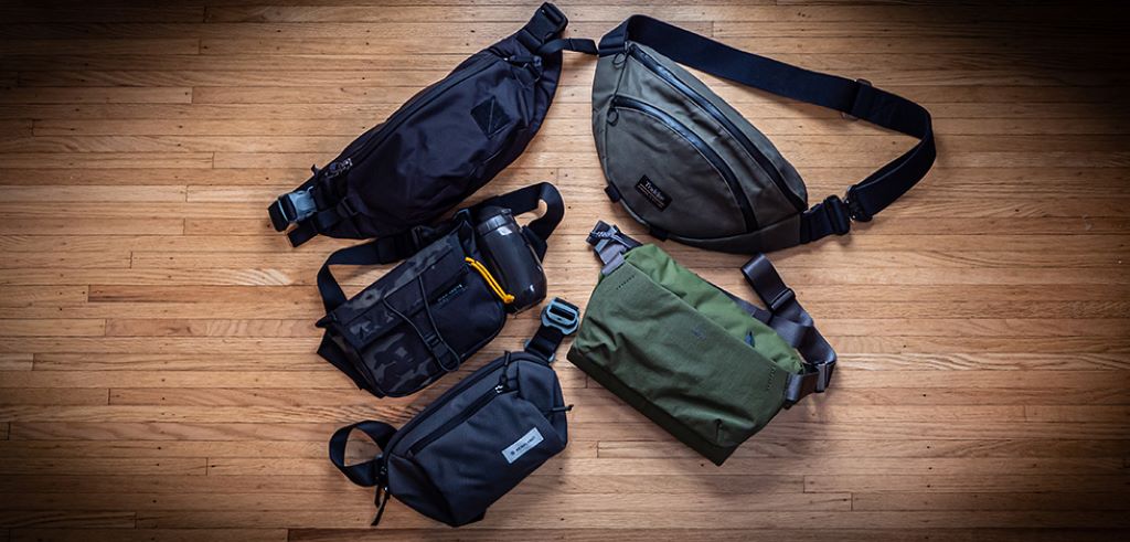 Close-up of compact sling bag with multiple compartments and zipper