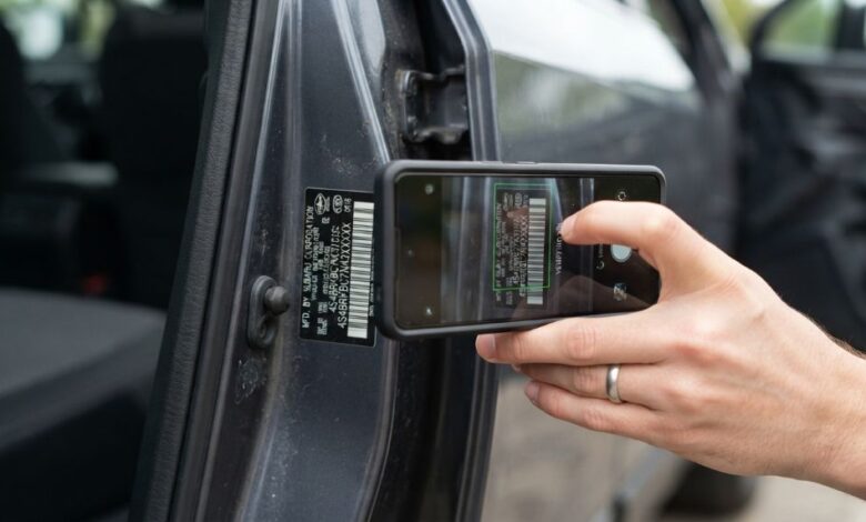 Checking a vehicle identification number on a used car